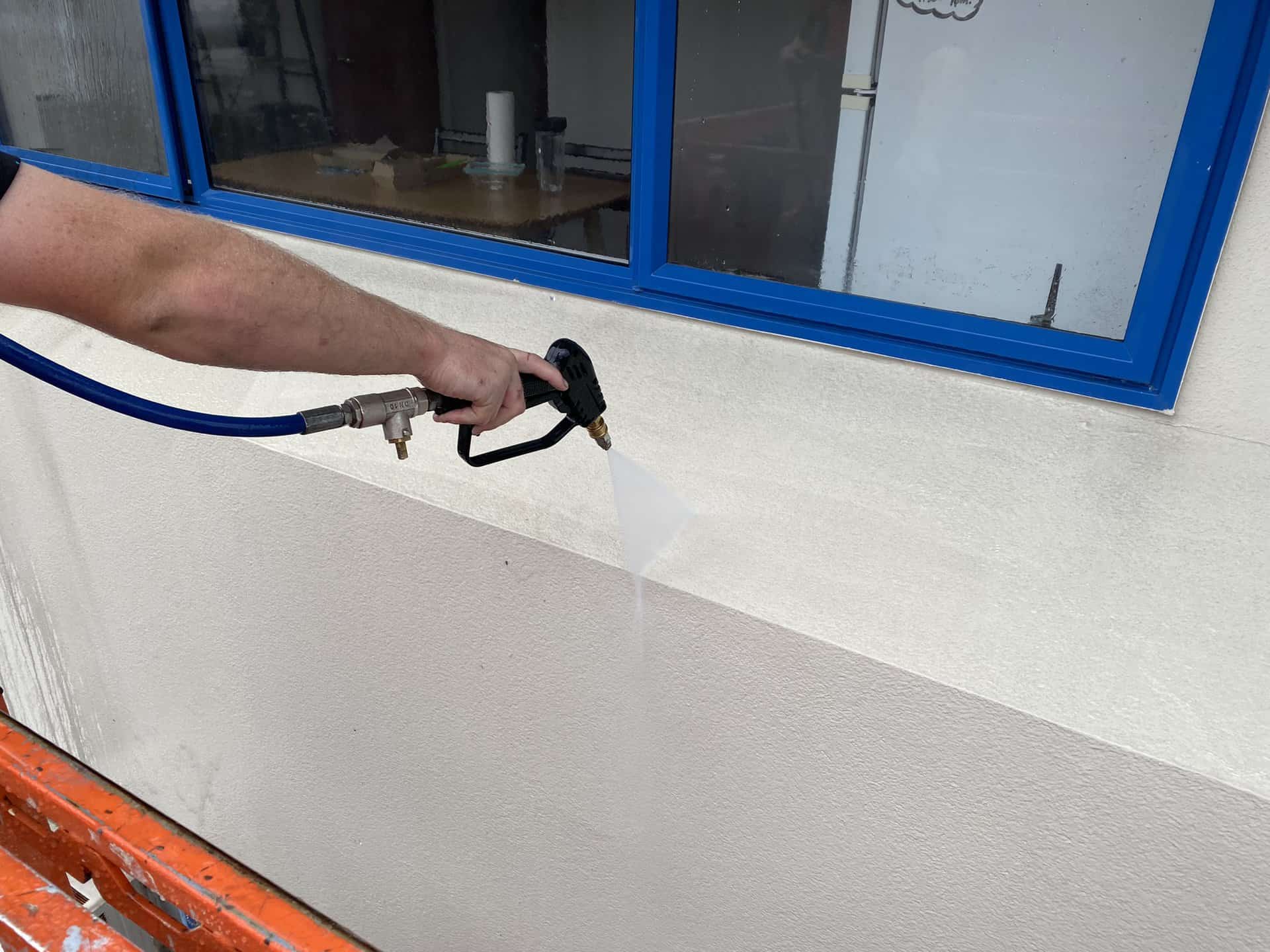 Cleaning of a concrete wall