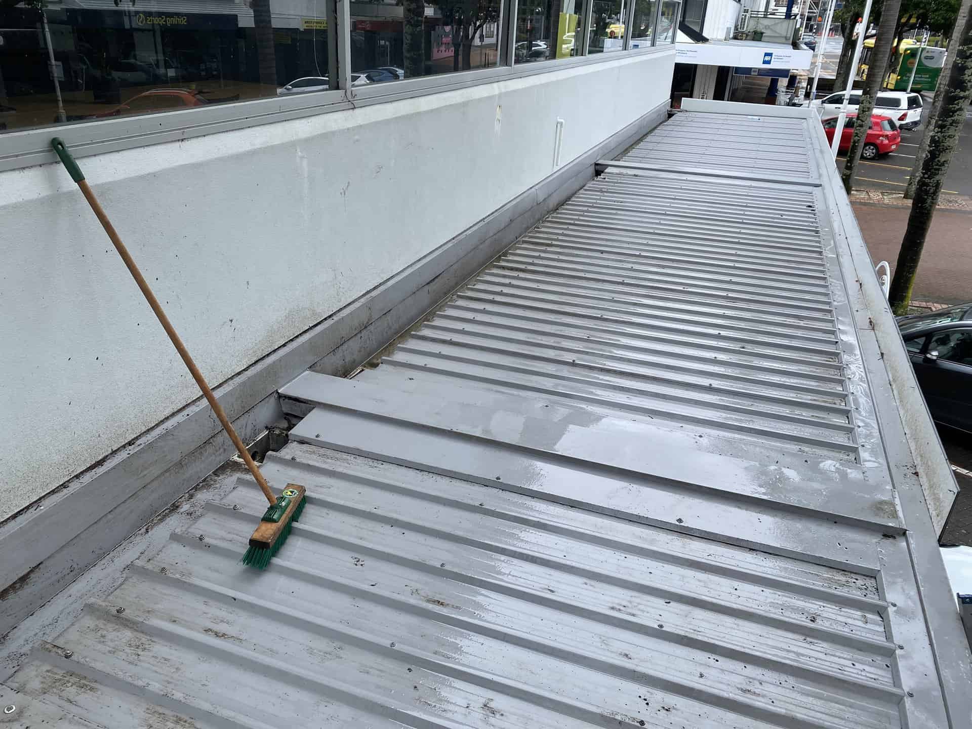 Cleaning roof sheets