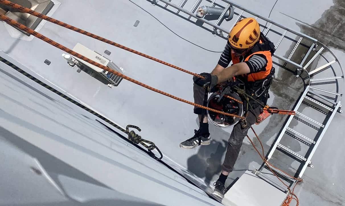 Rope Access from a building by a High Level Solutions professional